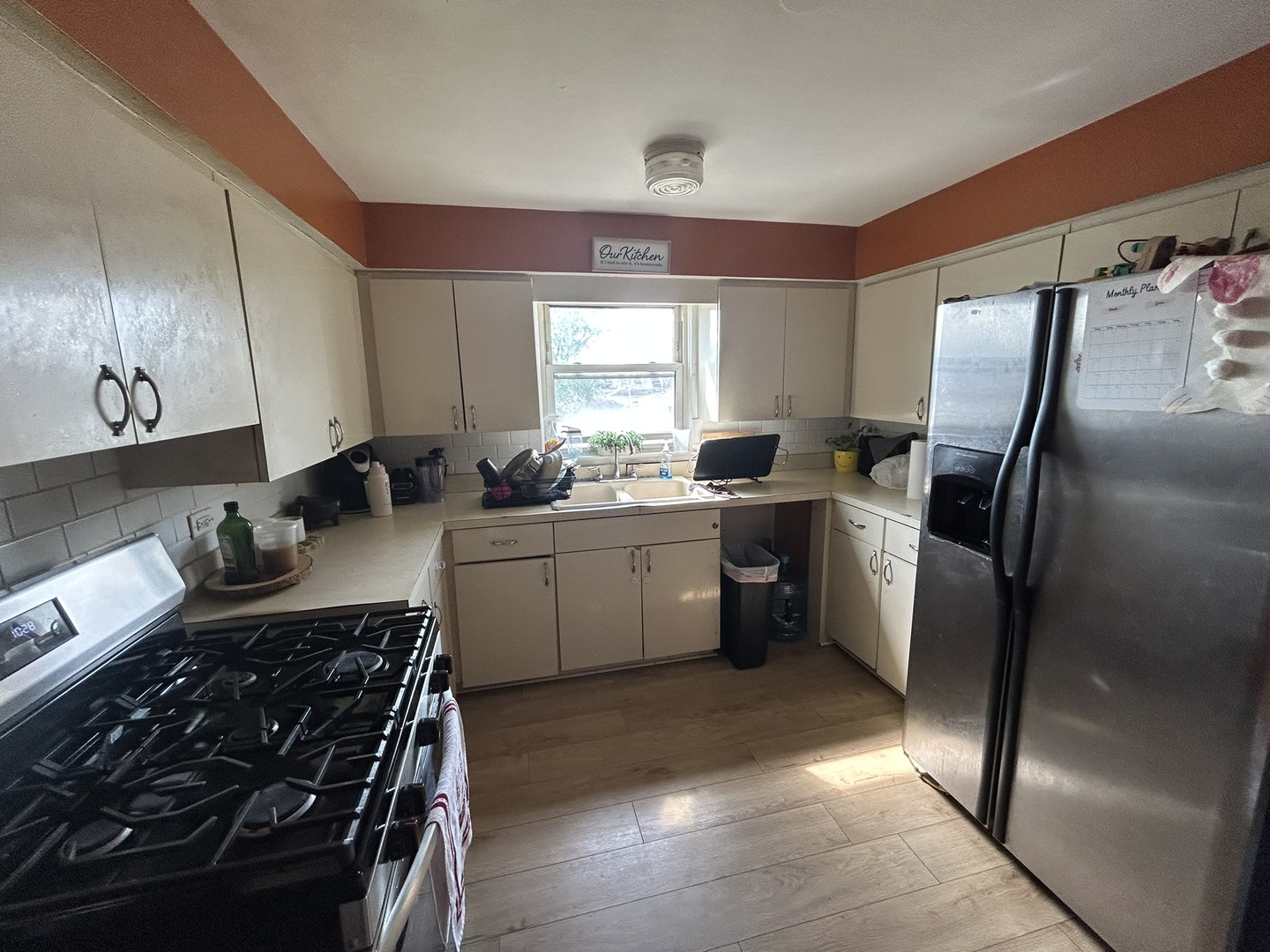 1724 North 19th Avenue Melrose Park, IL 60160 - Photo 13 of 16 a kitchen that has a sink stainless steel appliances a window and a counter top space