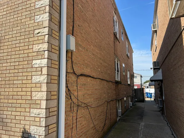 a view of a street with an outdoor space