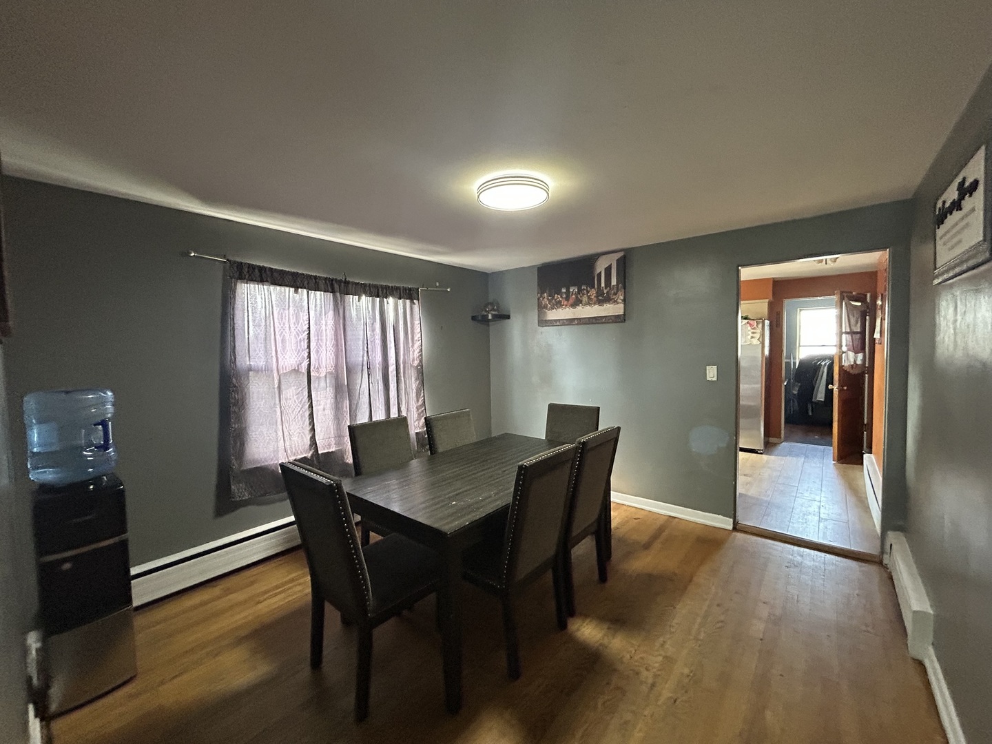 1724 North 19th Avenue Melrose Park, IL 60160 - Photo 10 of 16 a view of a dining room with furniture window and wooden floor