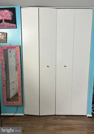 a bathroom with a sink a mirror and a toilet