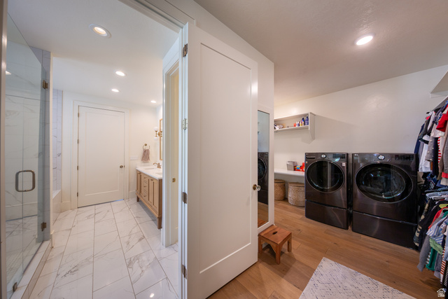 630 East Center Street Alpine, UT 84004 - Photo 47 of 115 Integrated laundry and wardrobe area featuring wood-finish flooring, a built-in shelving unit, and recessed lighting