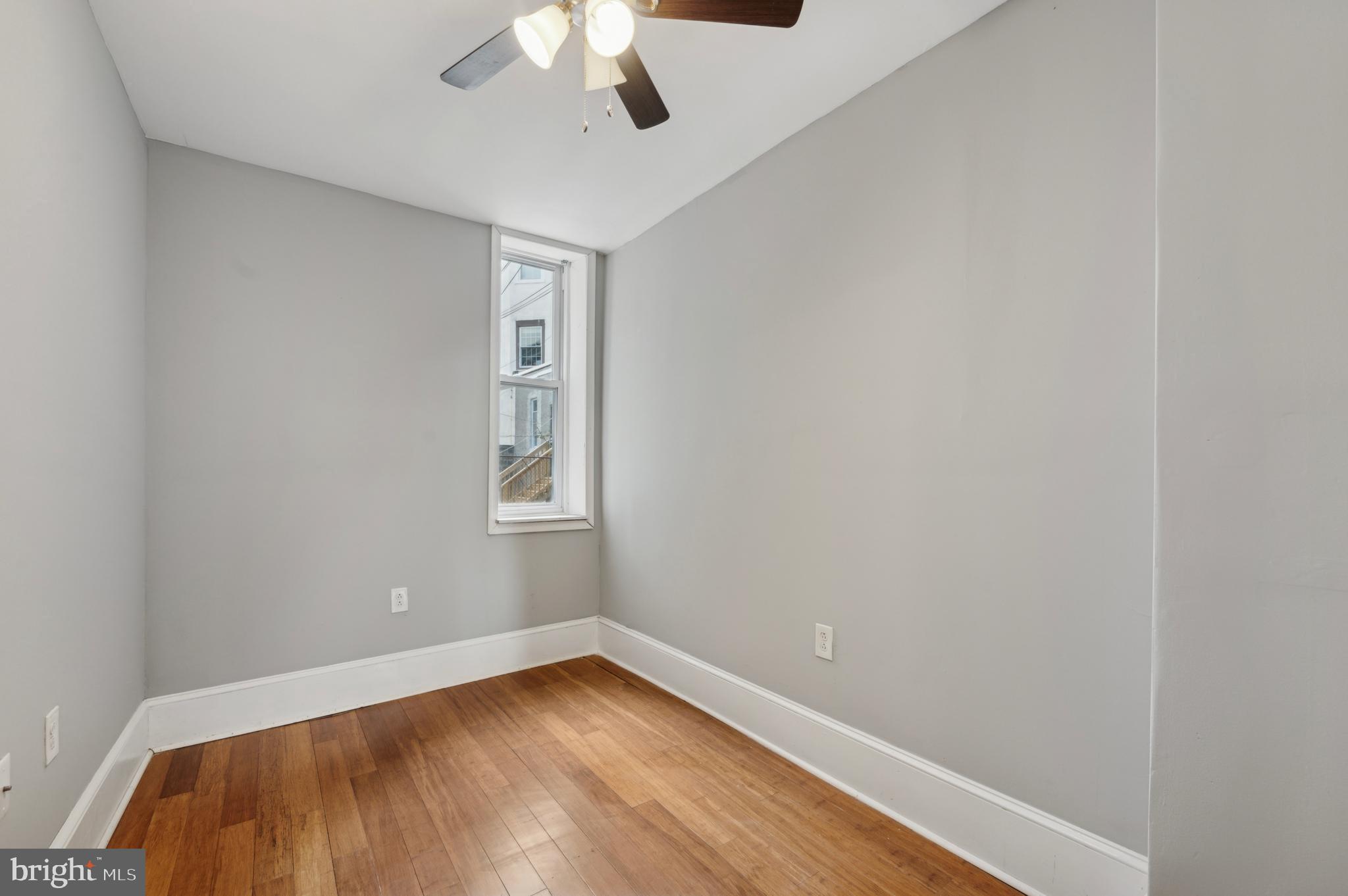 3236 West Berks Street Philadelphia, PA 19121 - Photo 12 of 35 a view of a room with wooden floor and natural light