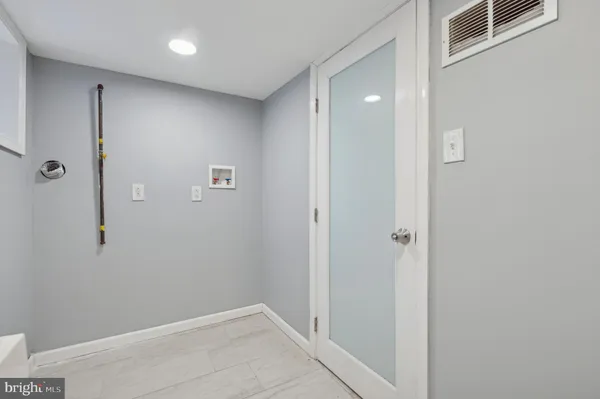 a view of kitchen and sink with wooden floor