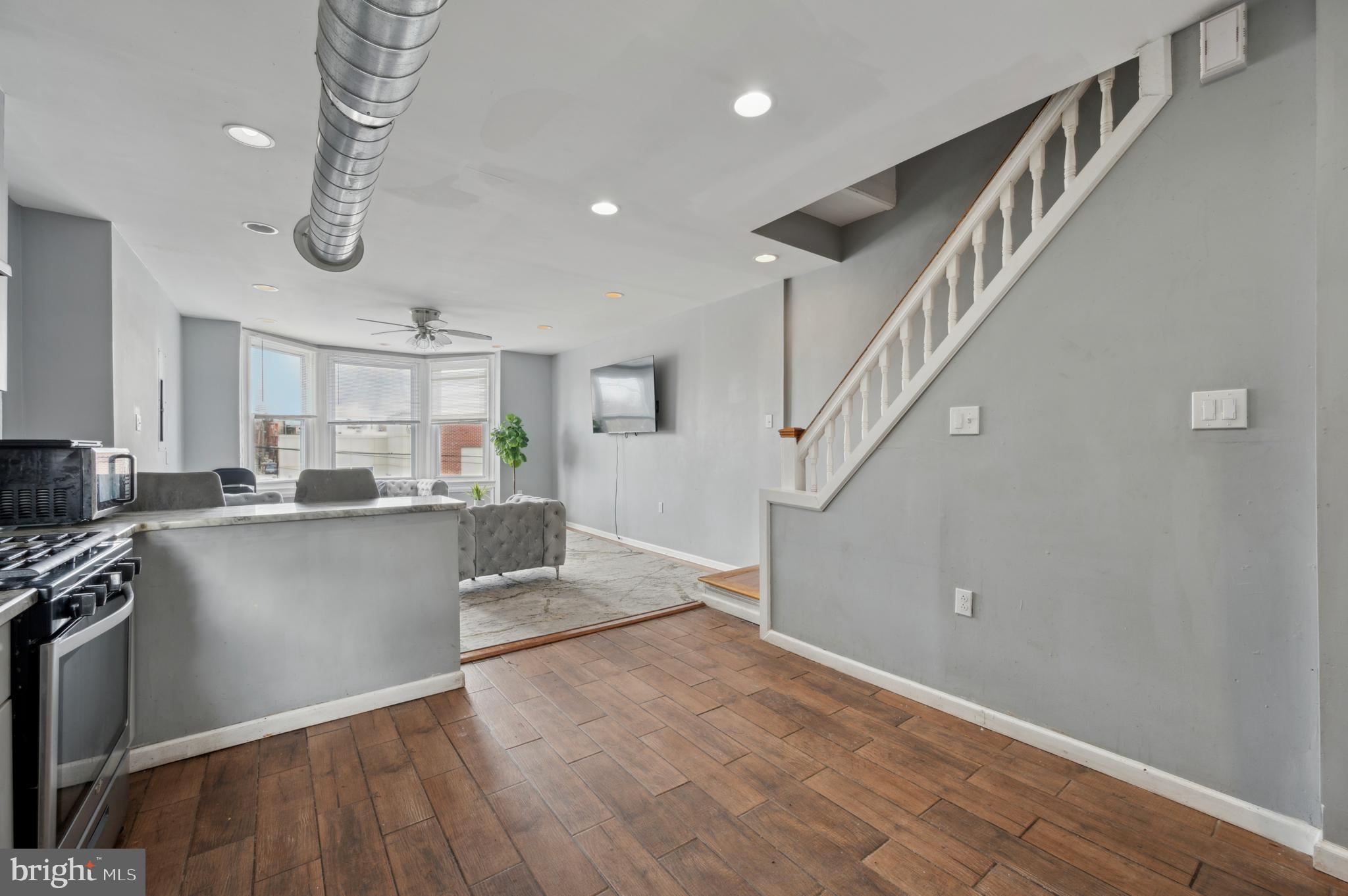 3236 West Berks Street Philadelphia, PA 19121 - Photo 23 of 35 a view of kitchen and sink with wooden floor