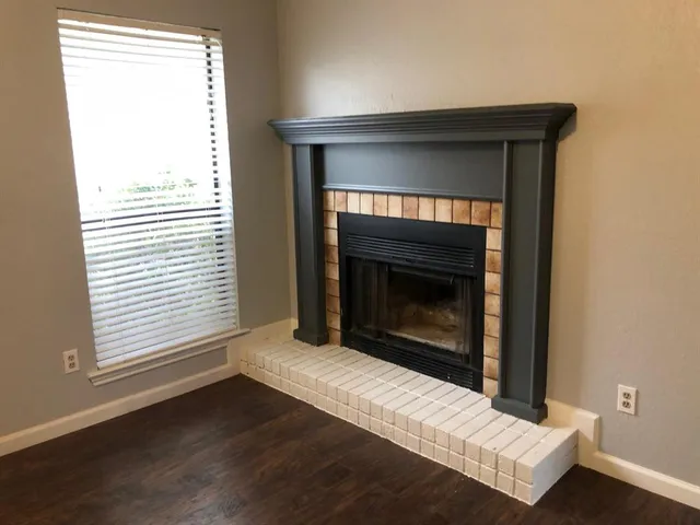 a living room with a fireplace in it