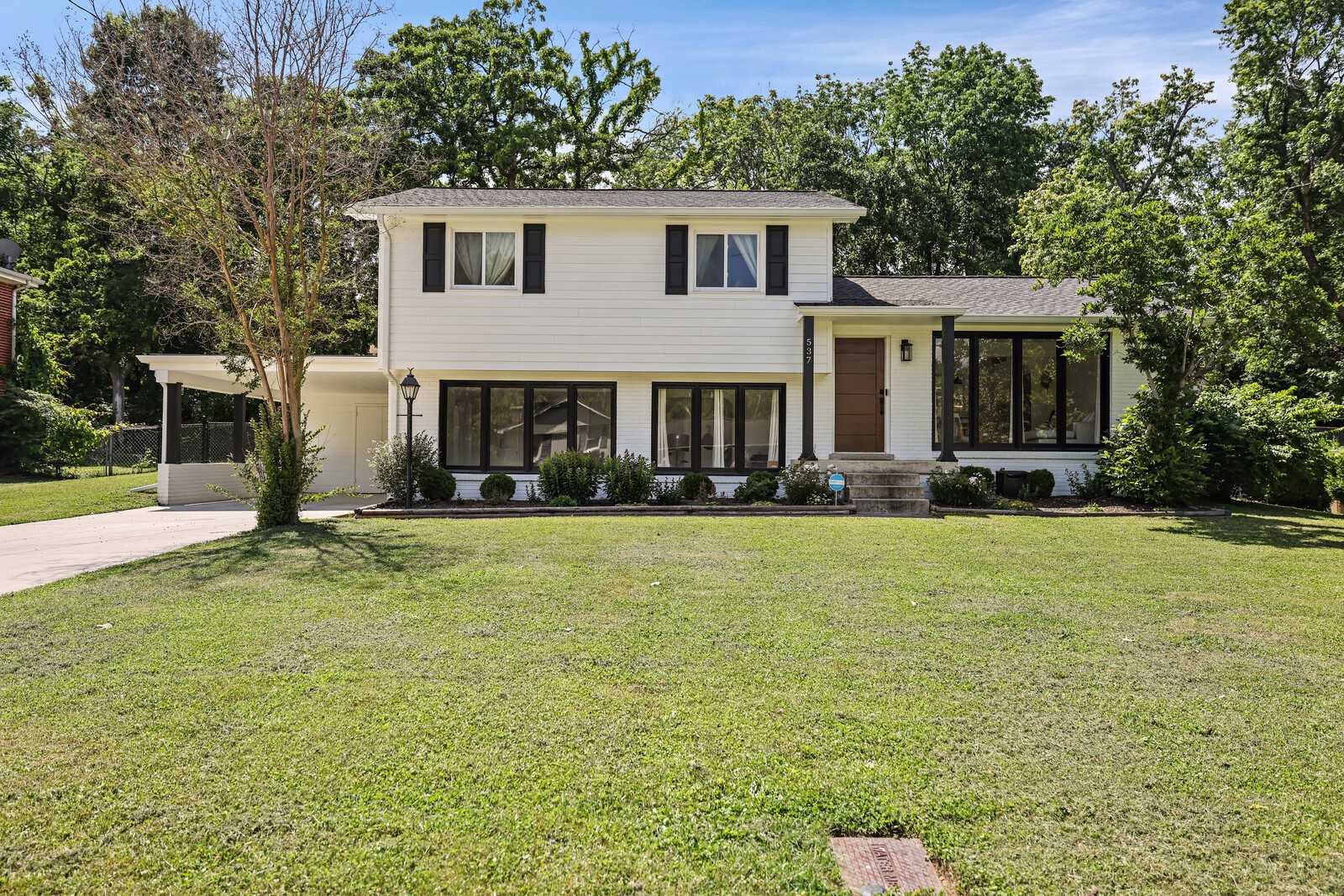 537 Rural Hill Road Nashville, TN 37217 - Photo 1 of 37 a front view of a house with garden