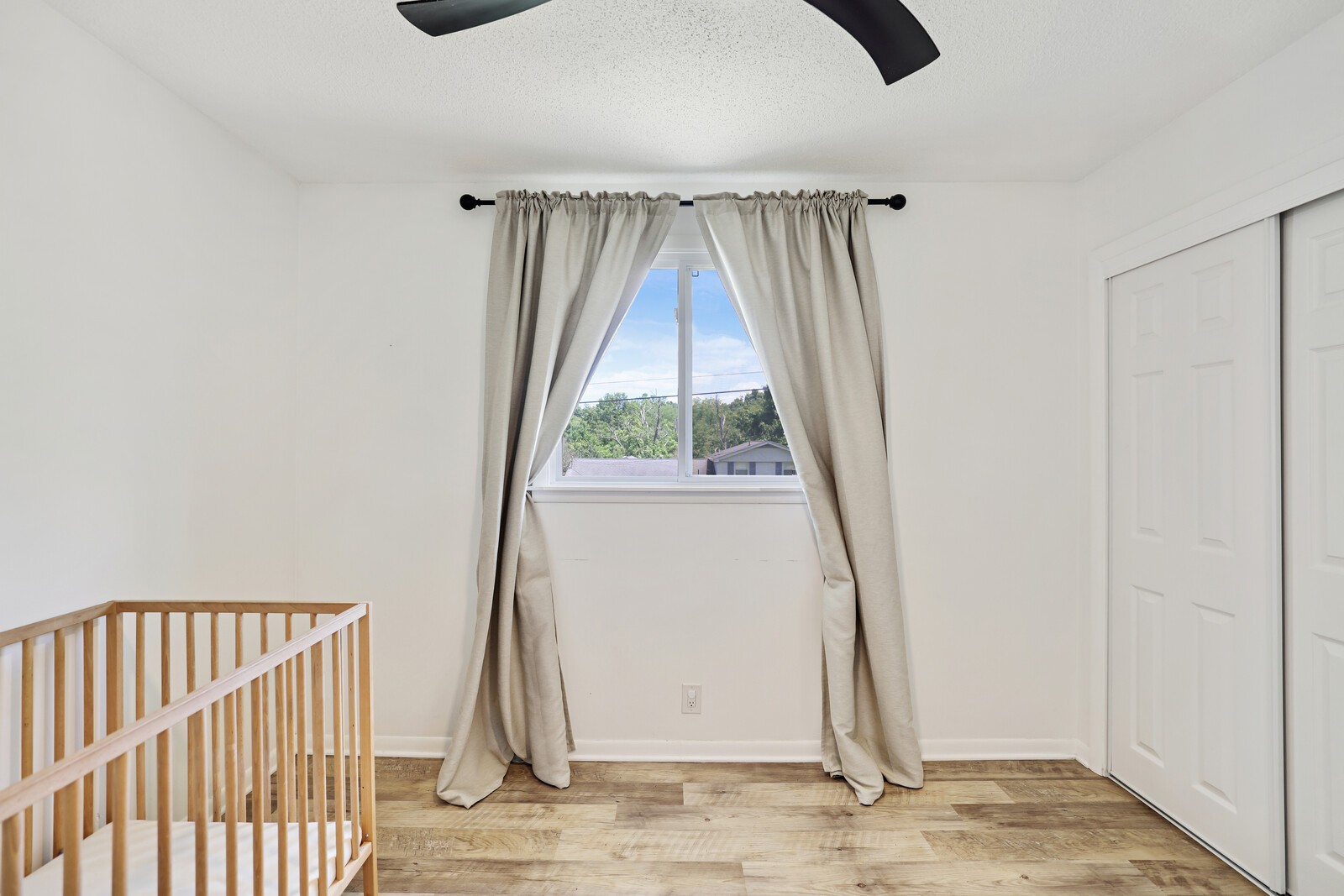 537 Rural Hill Road Nashville, TN 37217 - Photo 16 of 37 an empty room with wooden floor and a window