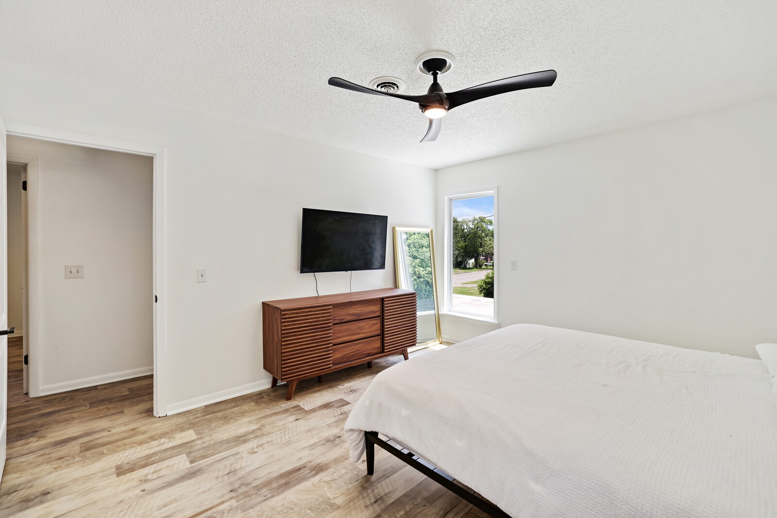 537 Rural Hill Road Nashville, TN 37217 - Photo 22 of 37 a bedroom with a bed and a flat screen tv