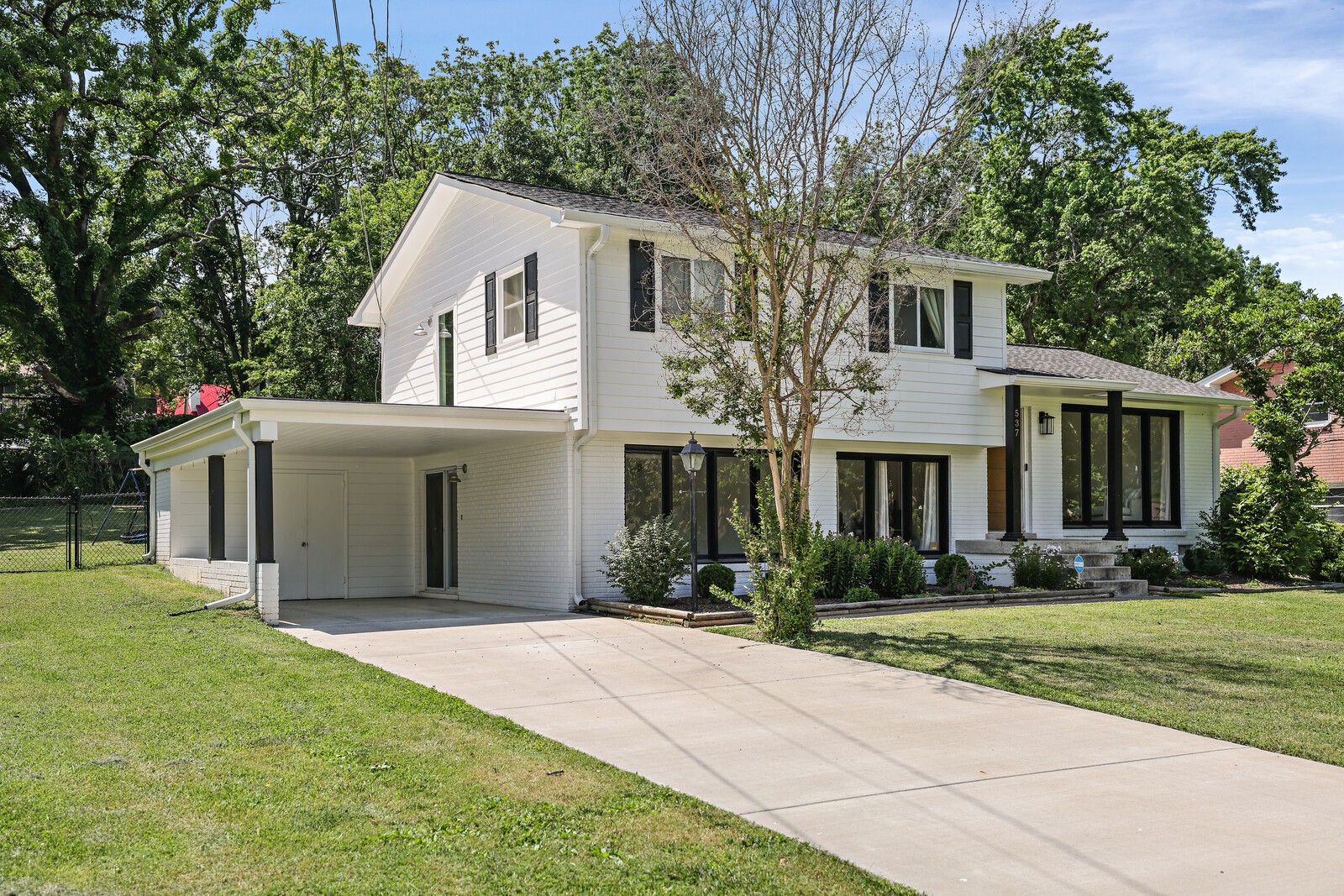 537 Rural Hill Road Nashville, TN 37217 - Photo 3 of 37 a front view of a house with a yard and garage