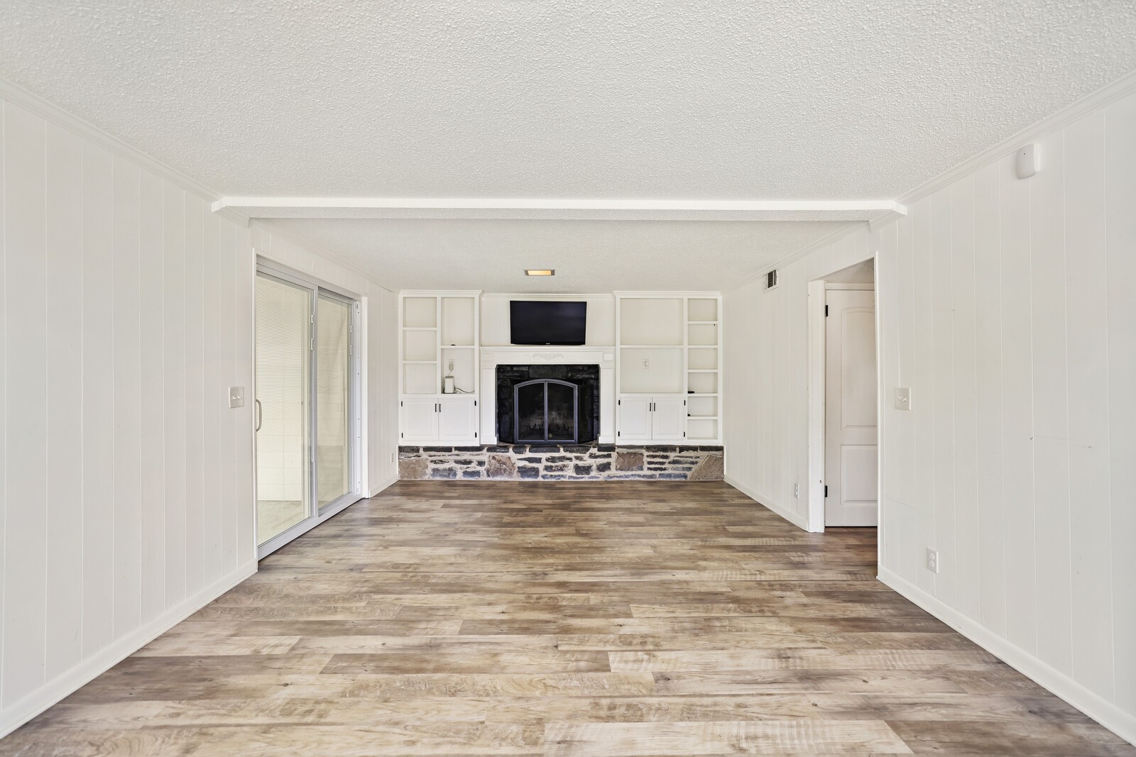 537 Rural Hill Road Nashville, TN 37217 - Photo 31 of 37 a view of an empty room with wooden floor fireplace and a window