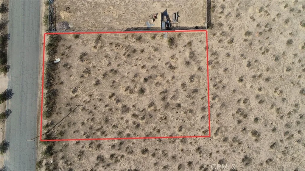 11 Olanche Street Mojave, CA 93501 - Photo 2 of 8 a bathroom with a shower curtain