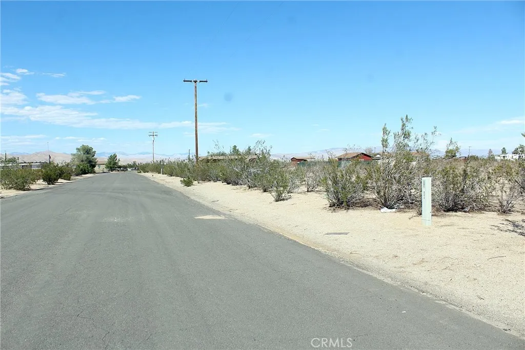 11 Olanche Street Mojave, CA 93501 - Photo 4 of 8 a view of a road with a building in the background