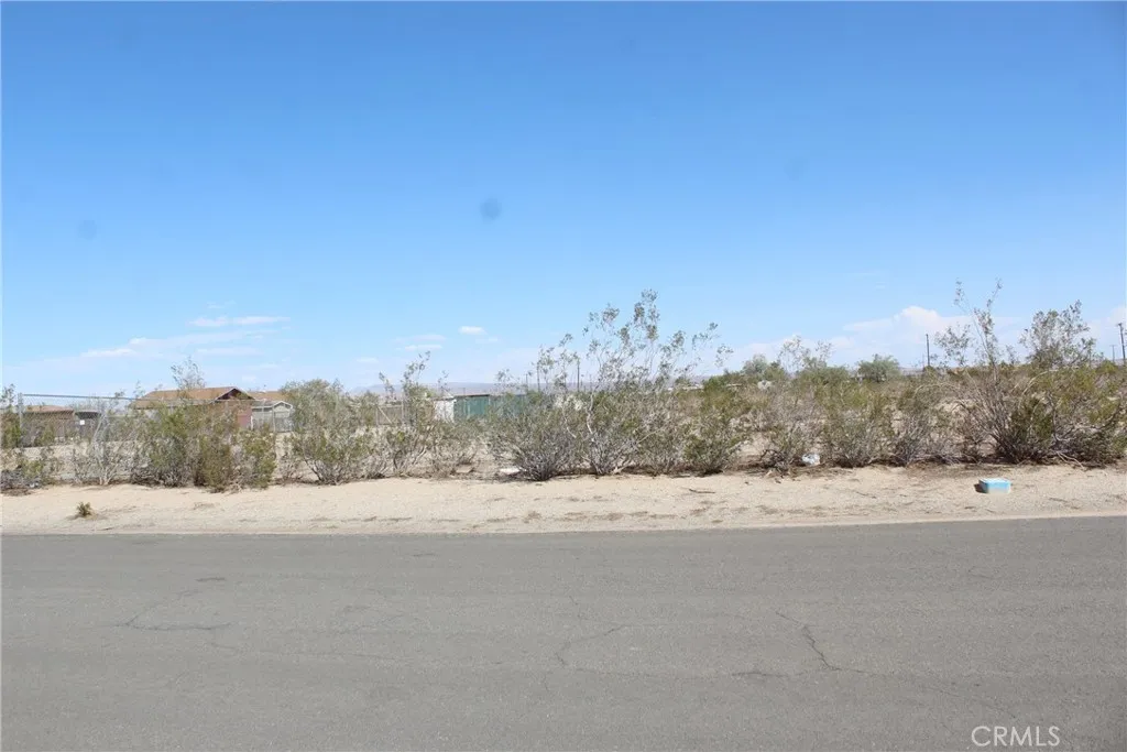 11 Olanche Street Mojave, CA 93501 - Photo 6 of 8 a view of a road with a building in the background