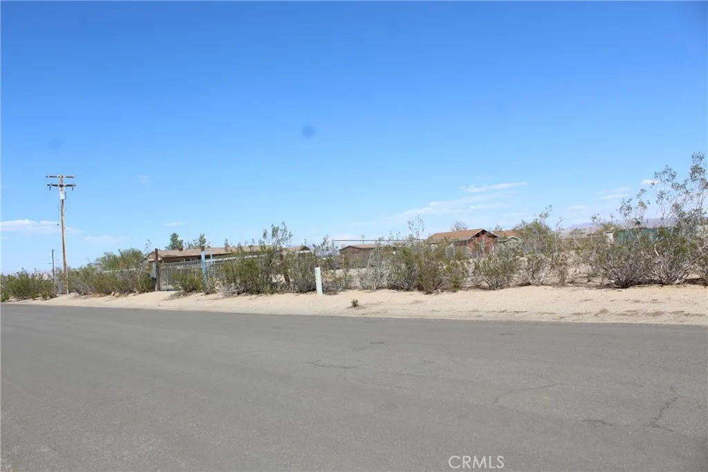 11 Olanche Street Mojave, CA 93501 - Photo 8 of 8 a view of an outdoor space with a road