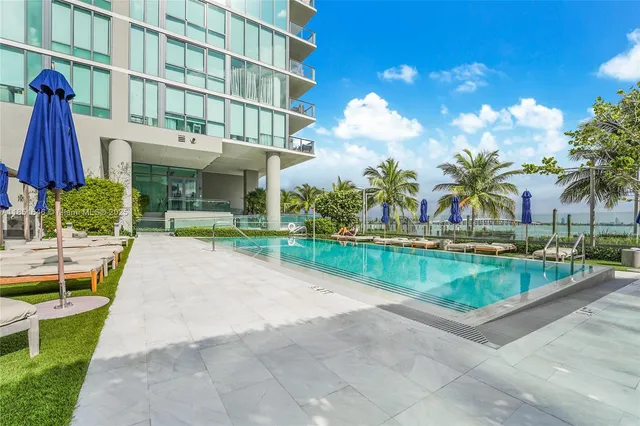 a view of building with yard