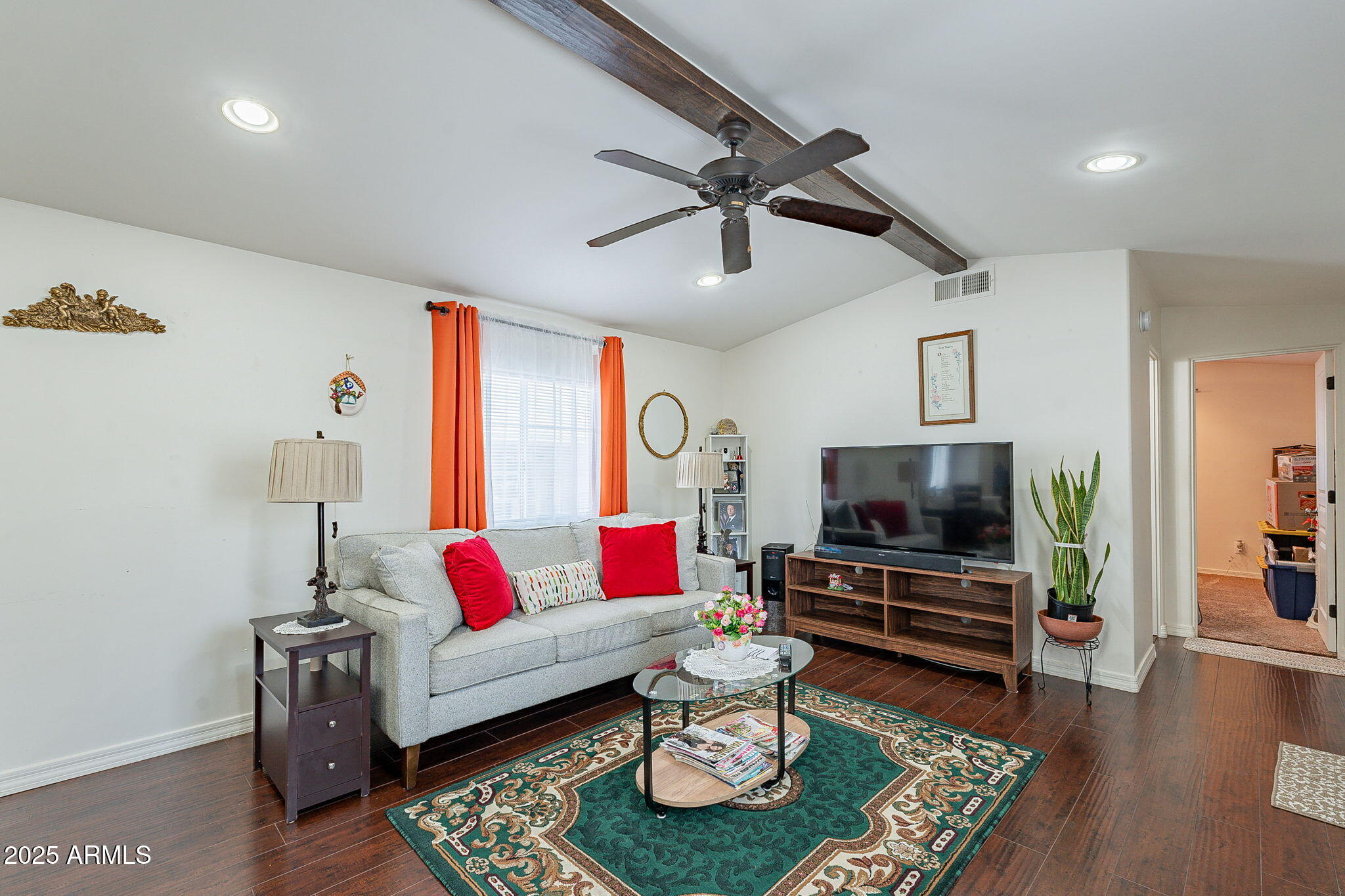 15606 South Gilbert Road, Unit 63 Chandler, AZ 85225 - Photo 5 of 21 a living room with furniture and a flat screen tv