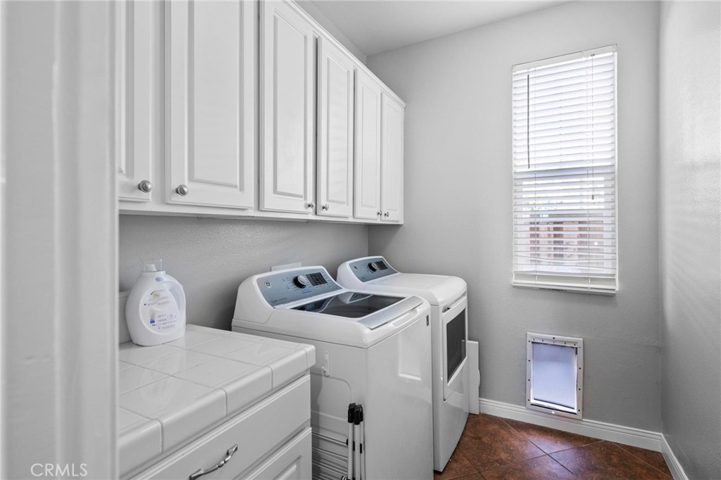 47 Bedstraw Loop Ladera Ranch, CA 92694 - Photo 12 of 44 a room with storage and utility