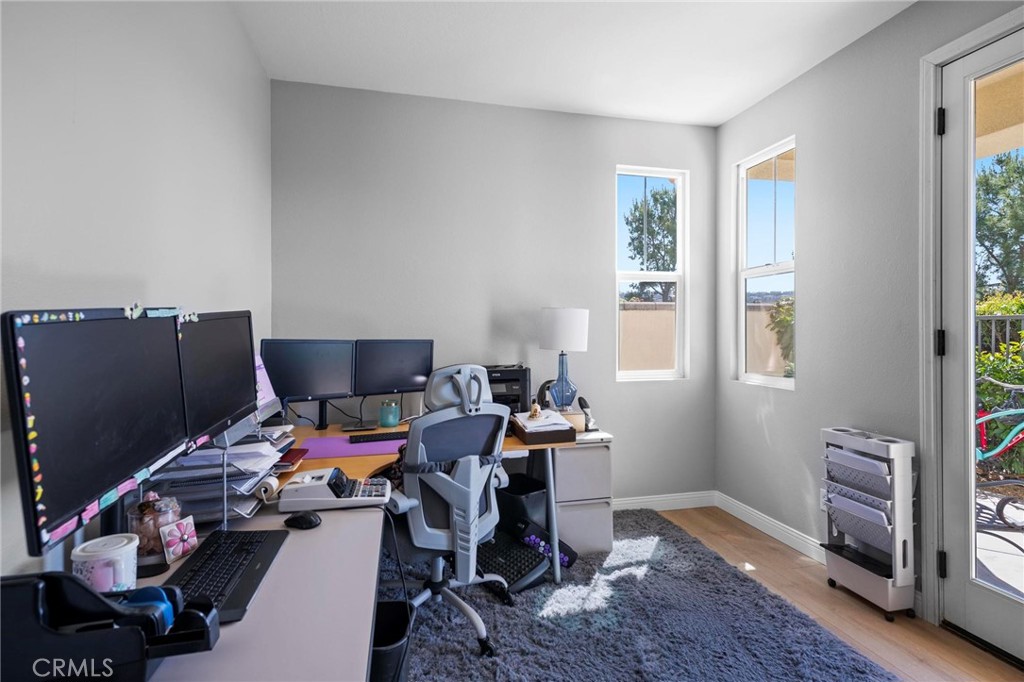 47 Bedstraw Loop Ladera Ranch, CA 92694 - Photo 13 of 44 a workspace with furniture and a window