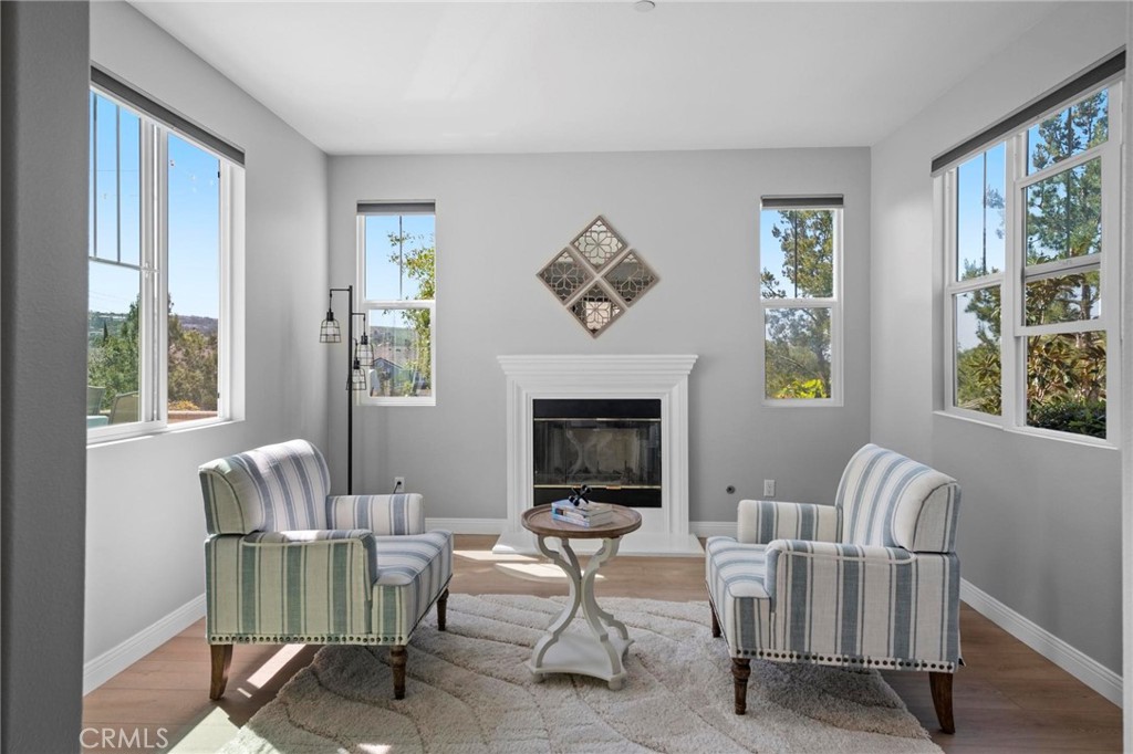47 Bedstraw Loop Ladera Ranch, CA 92694 - Photo 2 of 44 a living room with furniture and a fireplace