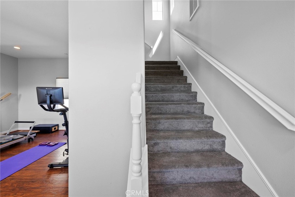 47 Bedstraw Loop Ladera Ranch, CA 92694 - Photo 22 of 44 a view of entryway and hall with wooden floor