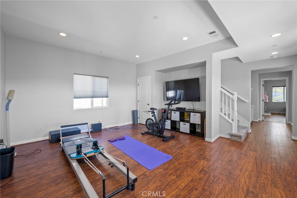 47 Bedstraw Loop Ladera Ranch, CA 92694 - Photo 23 of 44 a living room with furniture and a wooden floor