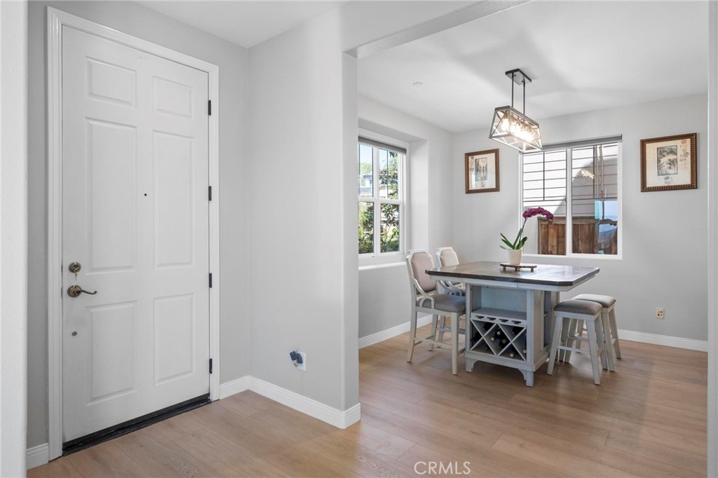 47 Bedstraw Loop Ladera Ranch, CA 92694 - Photo 3 of 44 a workspace with wooden floor
