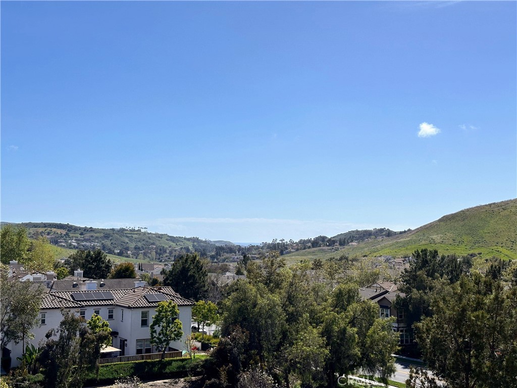 47 Bedstraw Loop Ladera Ranch, CA 92694 - Photo 37 of 44 an aerial view of residential house and green space