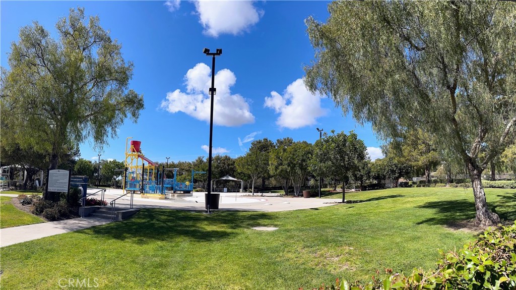 47 Bedstraw Loop Ladera Ranch, CA 92694 - Photo 41 of 44 a view of a fountain in front of a house with a fountain