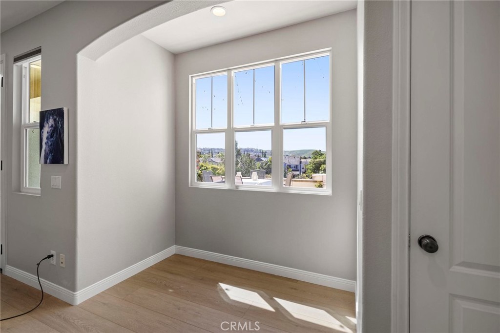 47 Bedstraw Loop Ladera Ranch, CA 92694 - Photo 5 of 44 a view of an empty room with a window