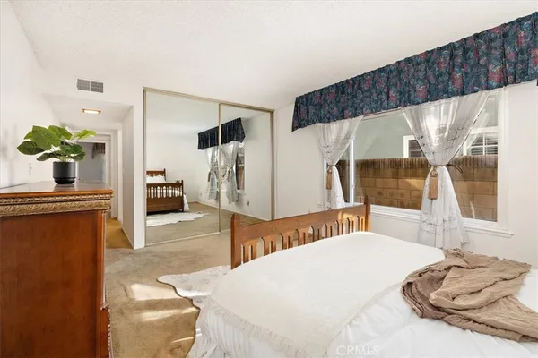 a view of empty room with floor to ceiling window