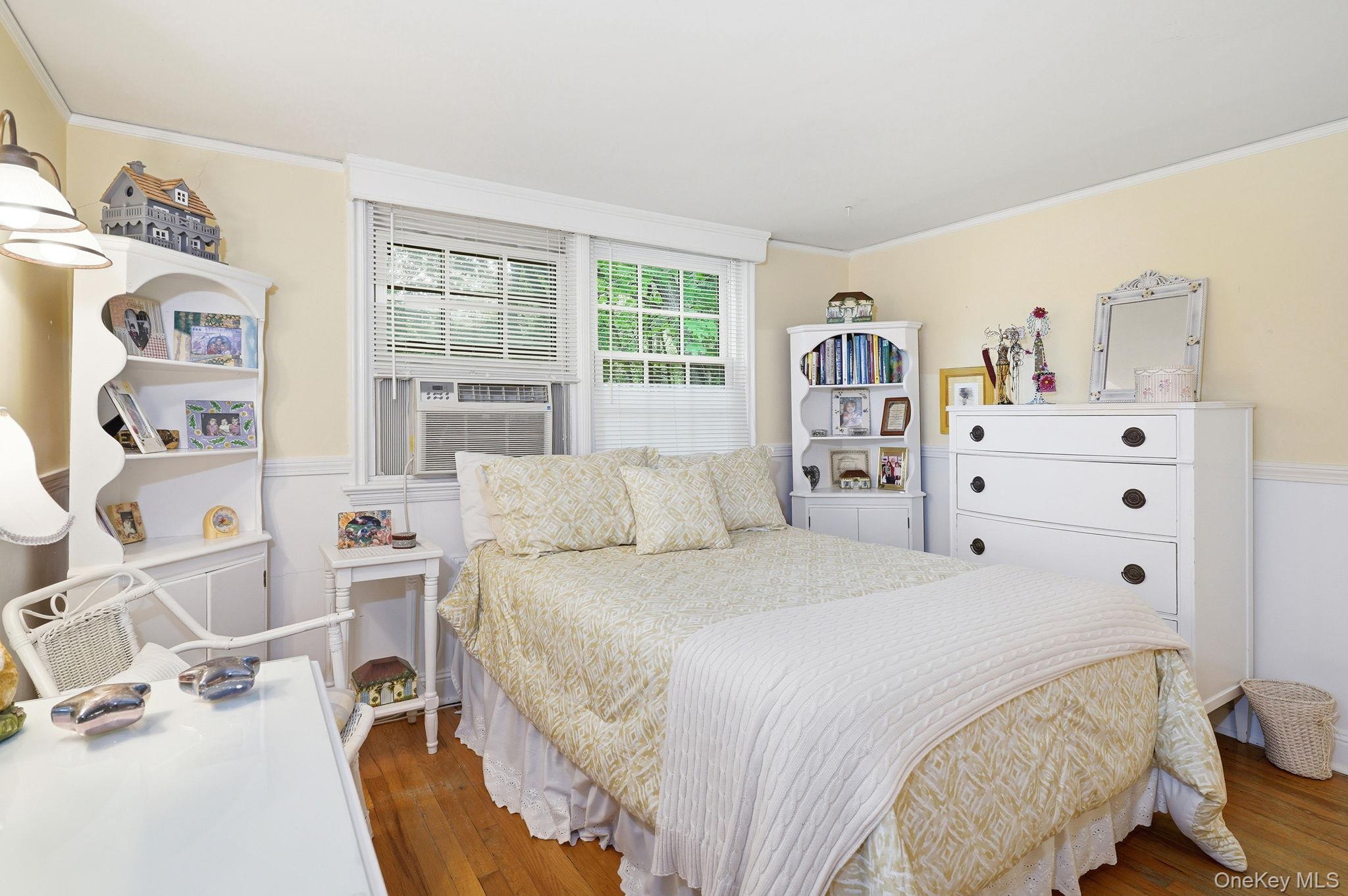 26 Cedarlawn Road Irvington, NY 10533 - Photo 24 of 34 a bedroom with a bed and a window