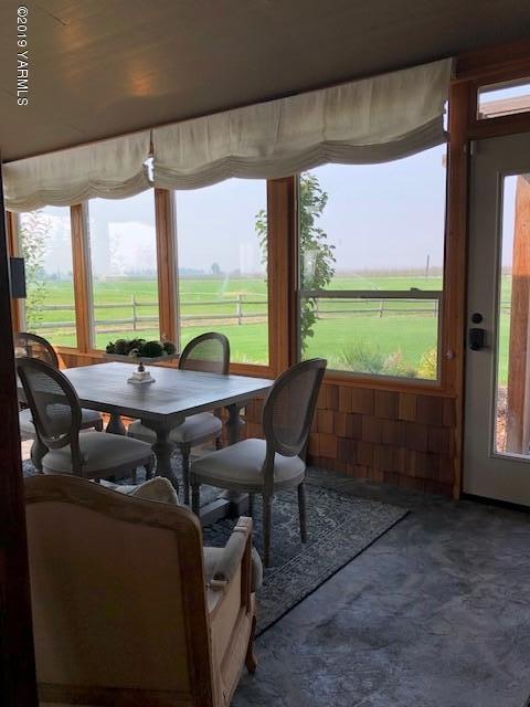 3141 West Wapato Road Wapato, WA 98951 - Photo 36 of 42 a view of a patio with lawn chairs next to a yard