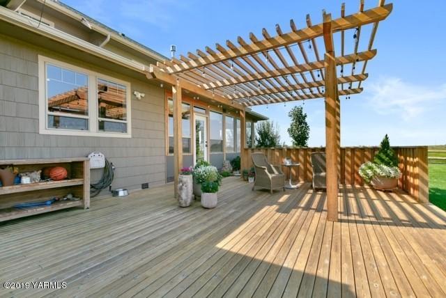3141 West Wapato Road Wapato, WA 98951 - Photo 41 of 42 a view of living room and deck with furniture