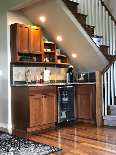 3141 West Wapato Road Wapato, WA 98951 - Photo 8 of 42 a kitchen with stainless steel appliances granite countertop a sink and cabinets