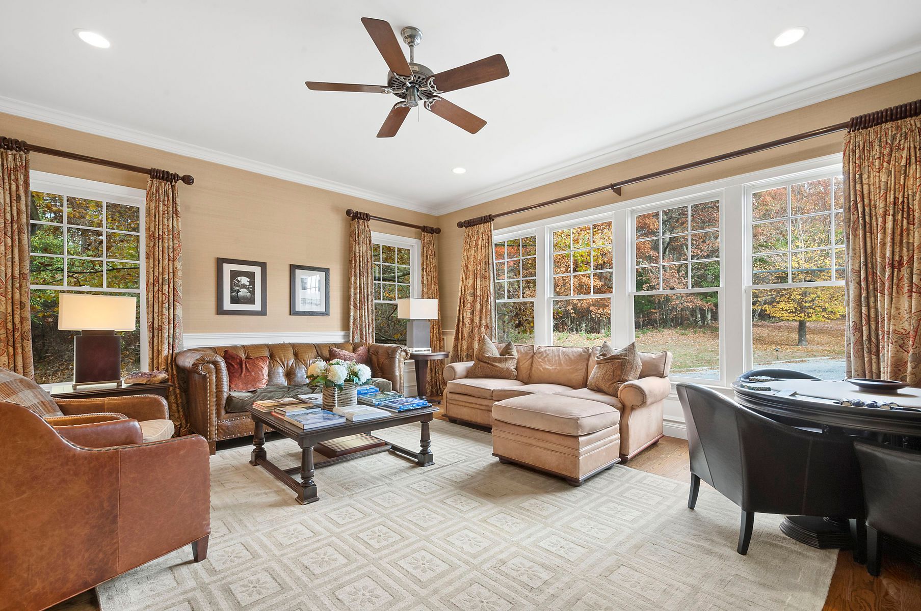 920 Old Sag Harbor Road Water Mill, NY 11976 - Photo 11 of 19 a living room with furniture and a large window