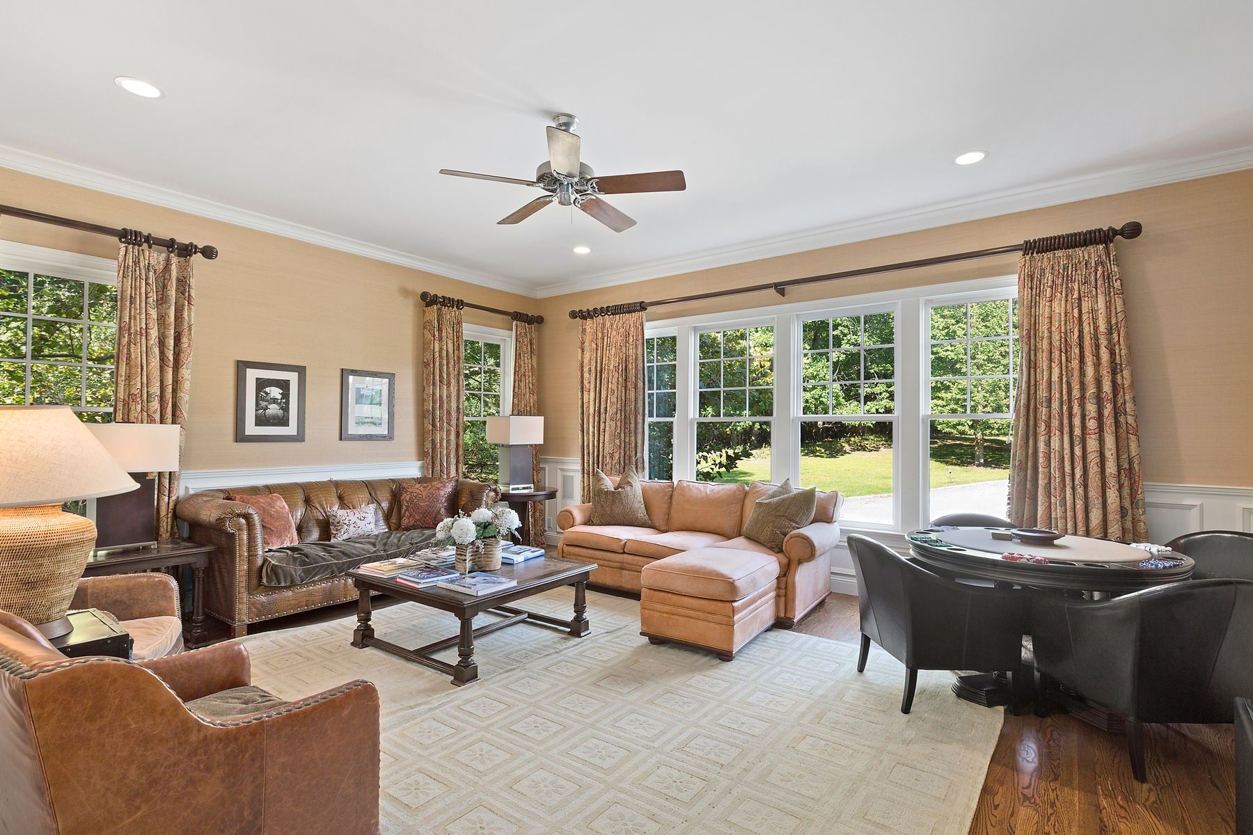 920 Old Sag Harbor Road Water Mill, NY 11976 - Photo 12 of 19 a living room with furniture and a large window