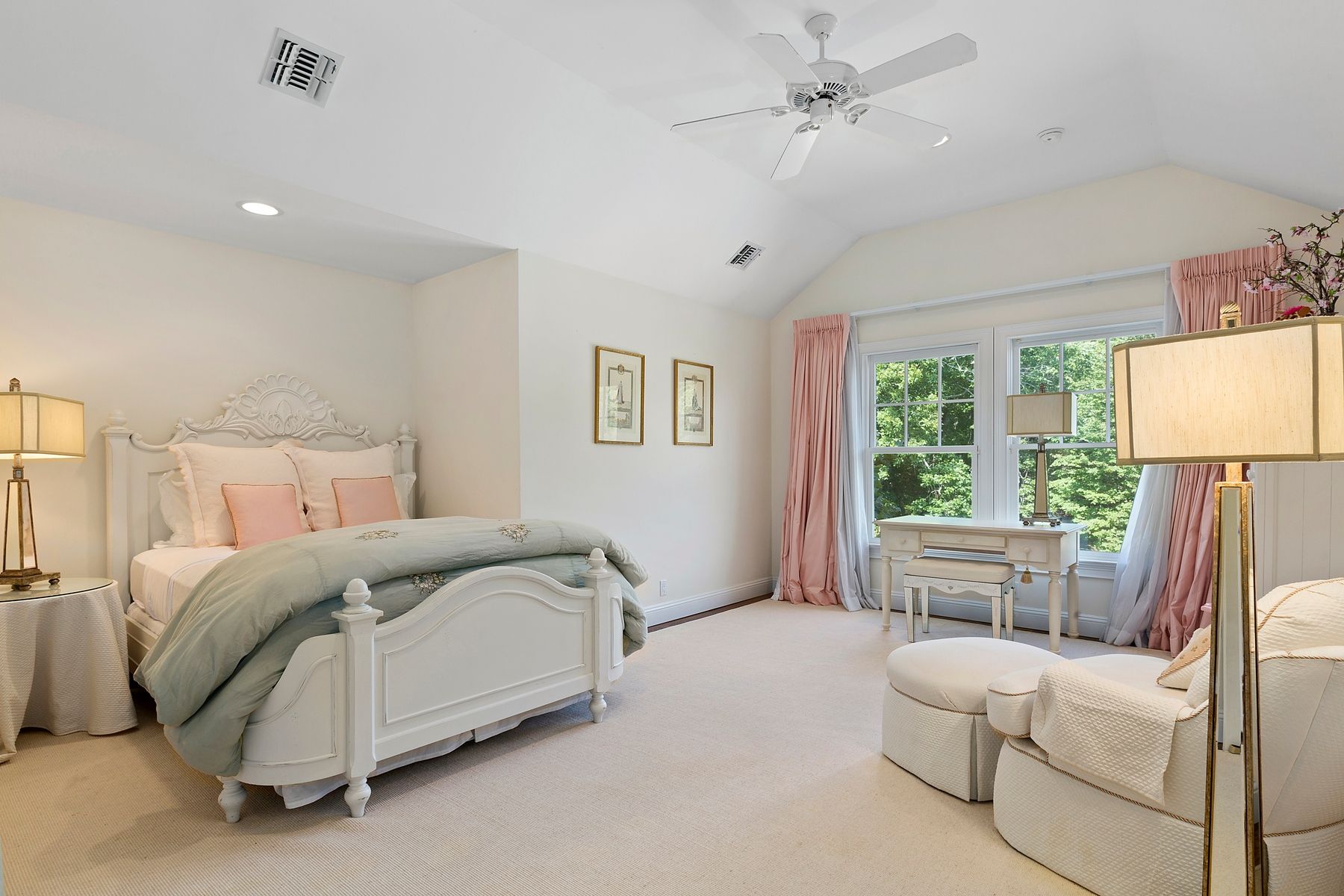 920 Old Sag Harbor Road Water Mill, NY 11976 - Photo 15 of 19 a spacious bedroom with a bed and a couch