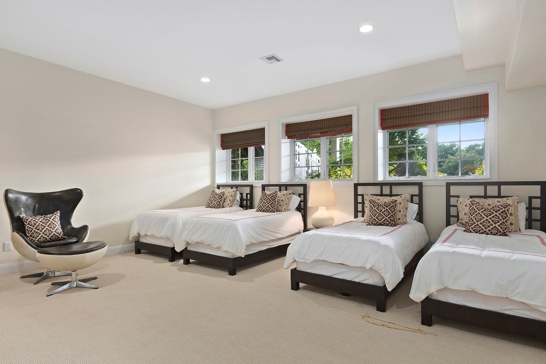 920 Old Sag Harbor Road Water Mill, NY 11976 - Photo 18 of 19 a bedroom with two beds and a couch