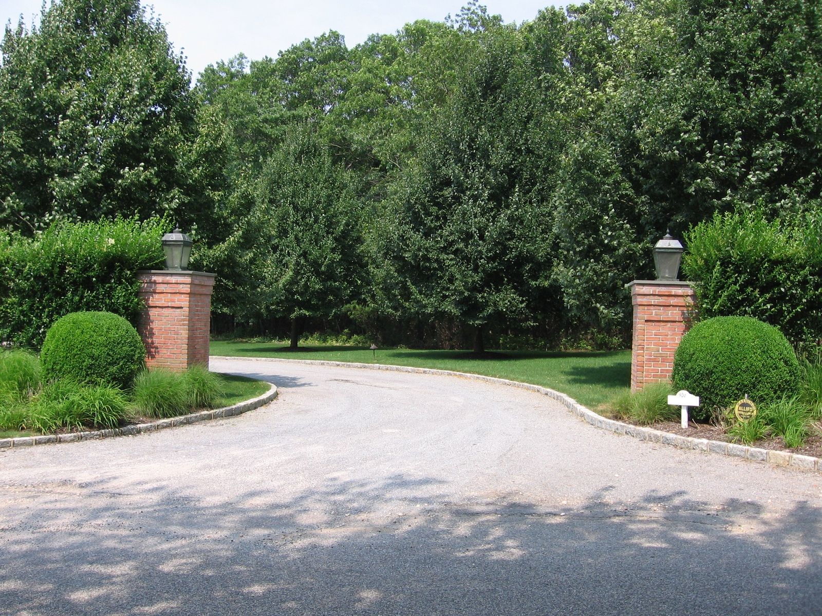920 Old Sag Harbor Road Water Mill, NY 11976 - Photo 2 of 19 a house with a outdoor space