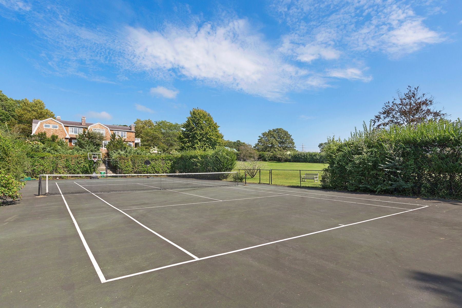 920 Old Sag Harbor Road Water Mill, NY 11976 - Photo 3 of 19 a view of a tennis court