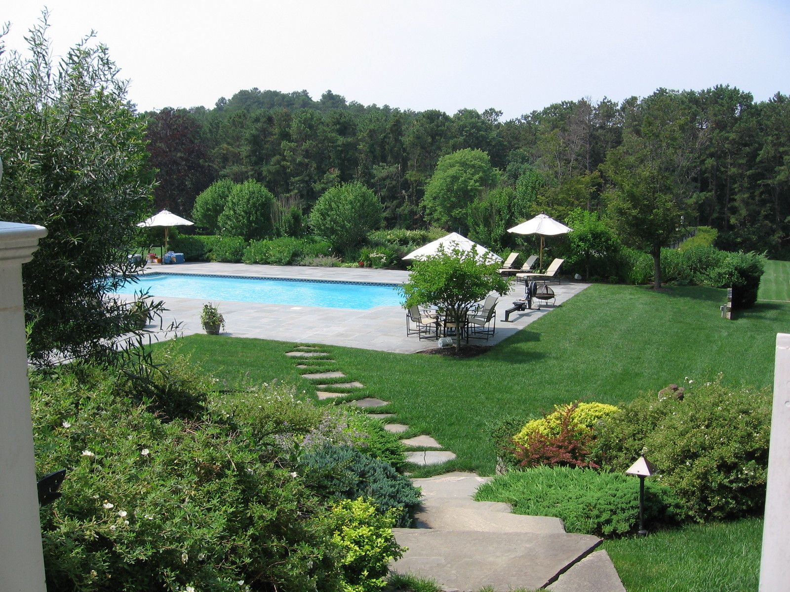 920 Old Sag Harbor Road Water Mill, NY 11976 - Photo 7 of 19 a view of a garden with sitting area