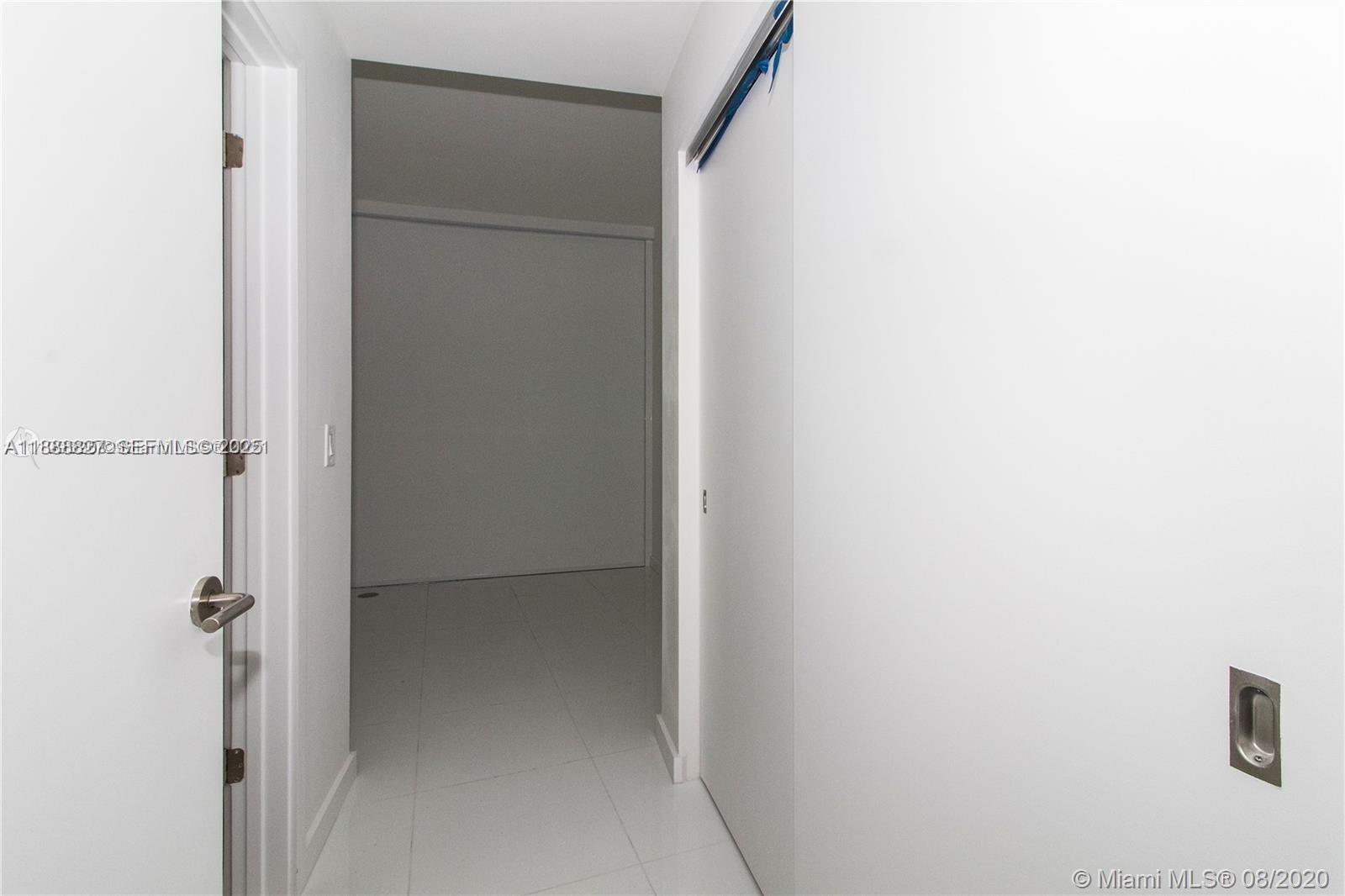 851 Northeast 1st Avenue, Unit 3601 Miami, FL 33132 - Photo 15 of 49 a view of a closet