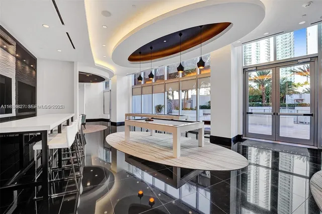 a view of a dining room with furniture window and outside view
