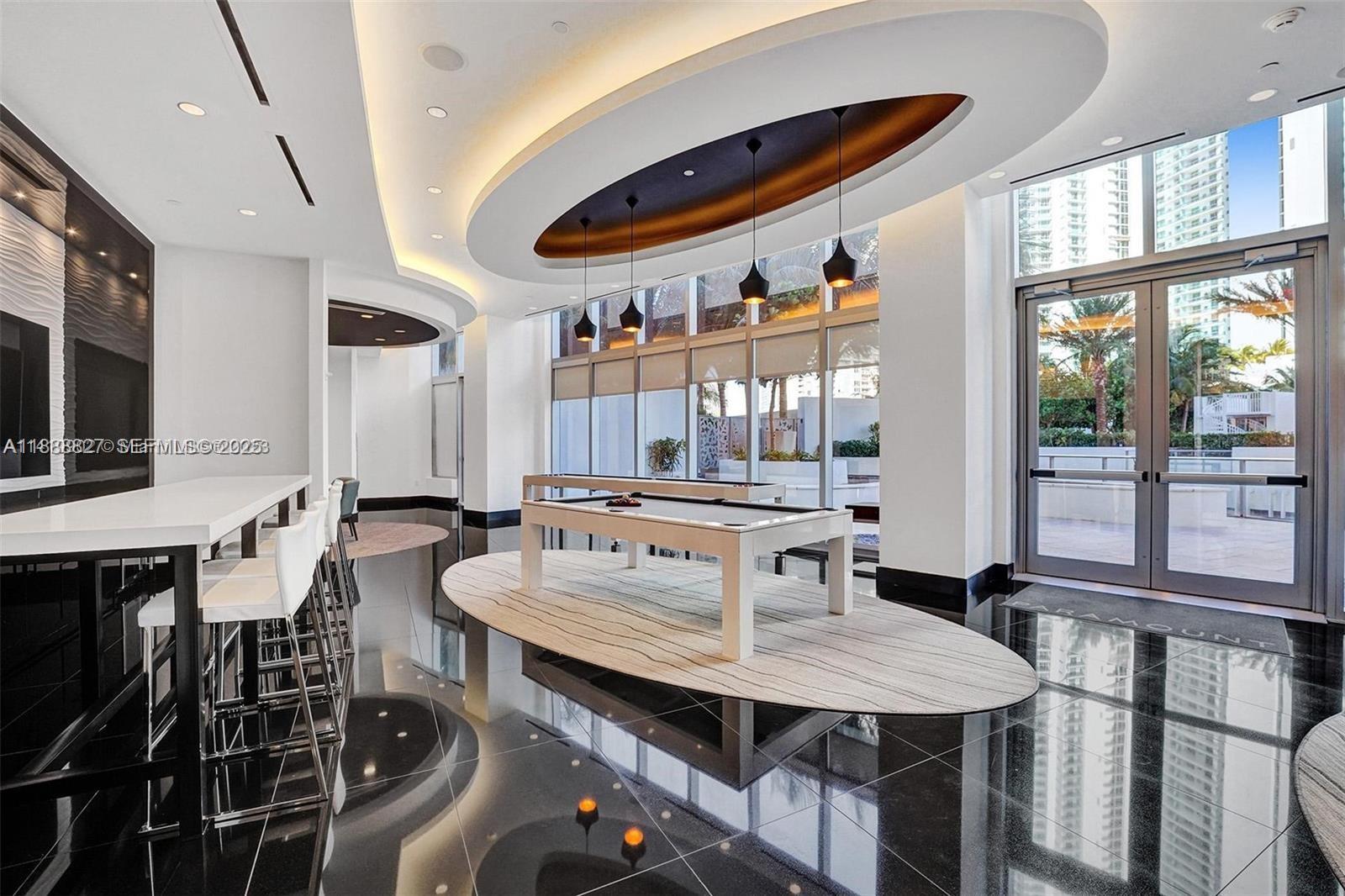 851 Northeast 1st Avenue, Unit 3601 Miami, FL 33132 - Photo 40 of 49 a view of a dining room with furniture window and outside view