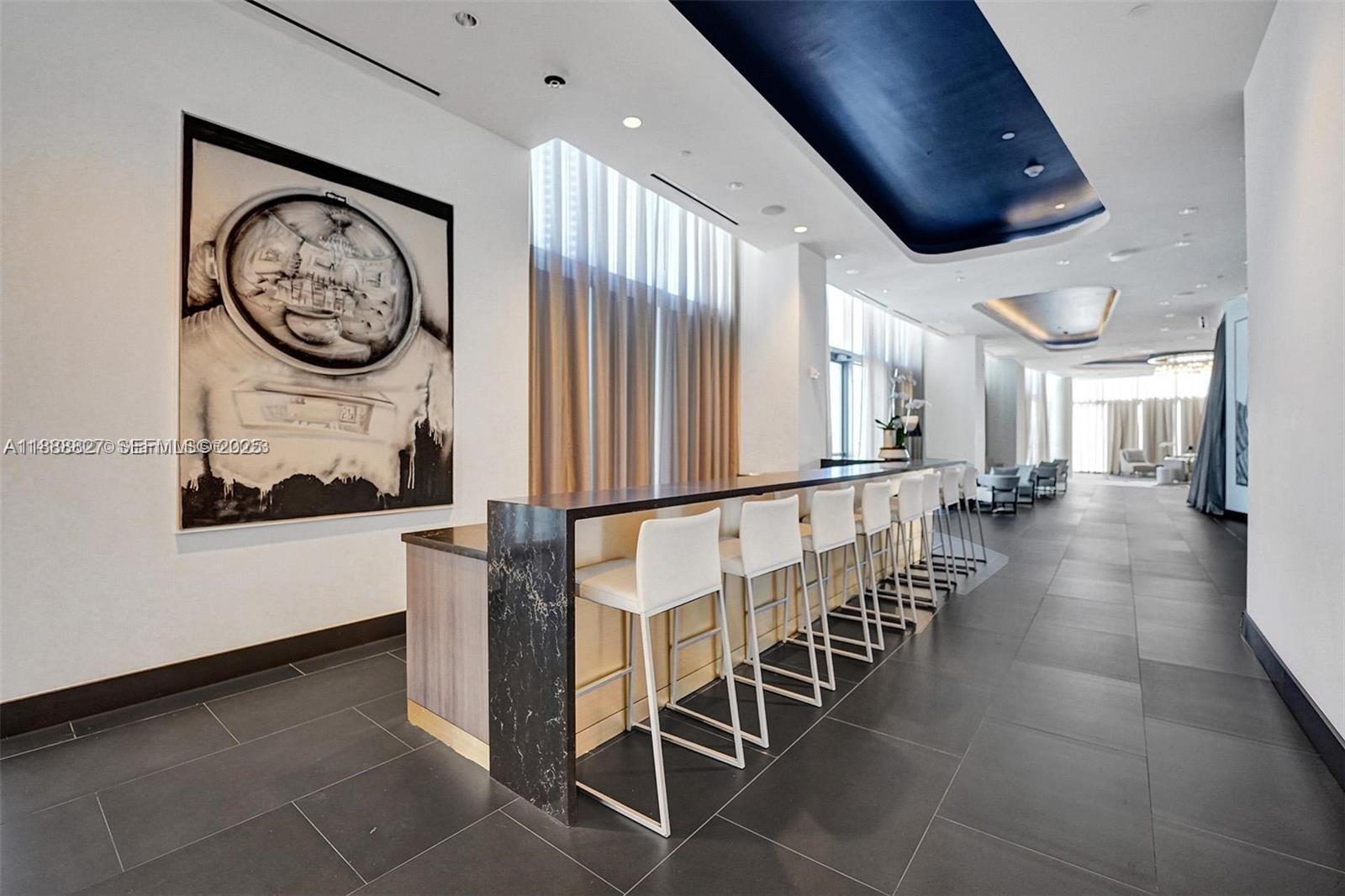 851 Northeast 1st Avenue, Unit 3601 Miami, FL 33132 - Photo 41 of 49 a view of a hallway with seating area