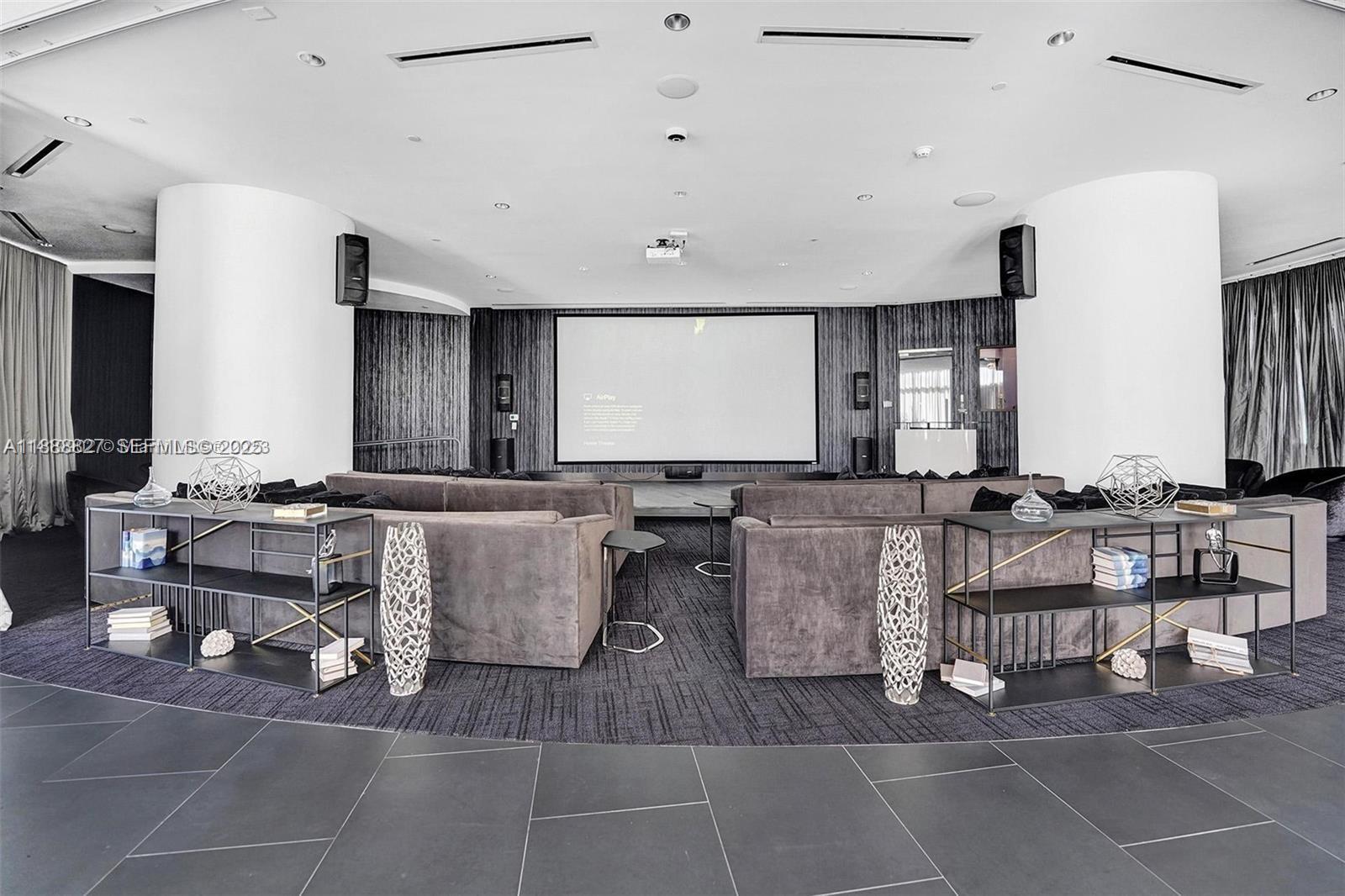 851 Northeast 1st Avenue, Unit 3601 Miami, FL 33132 - Photo 43 of 49 a room with lots of tables and chairs