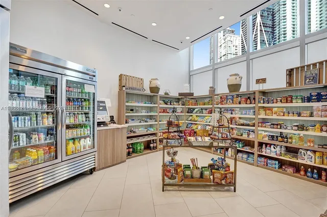 a room with lots of books and lots of furniture