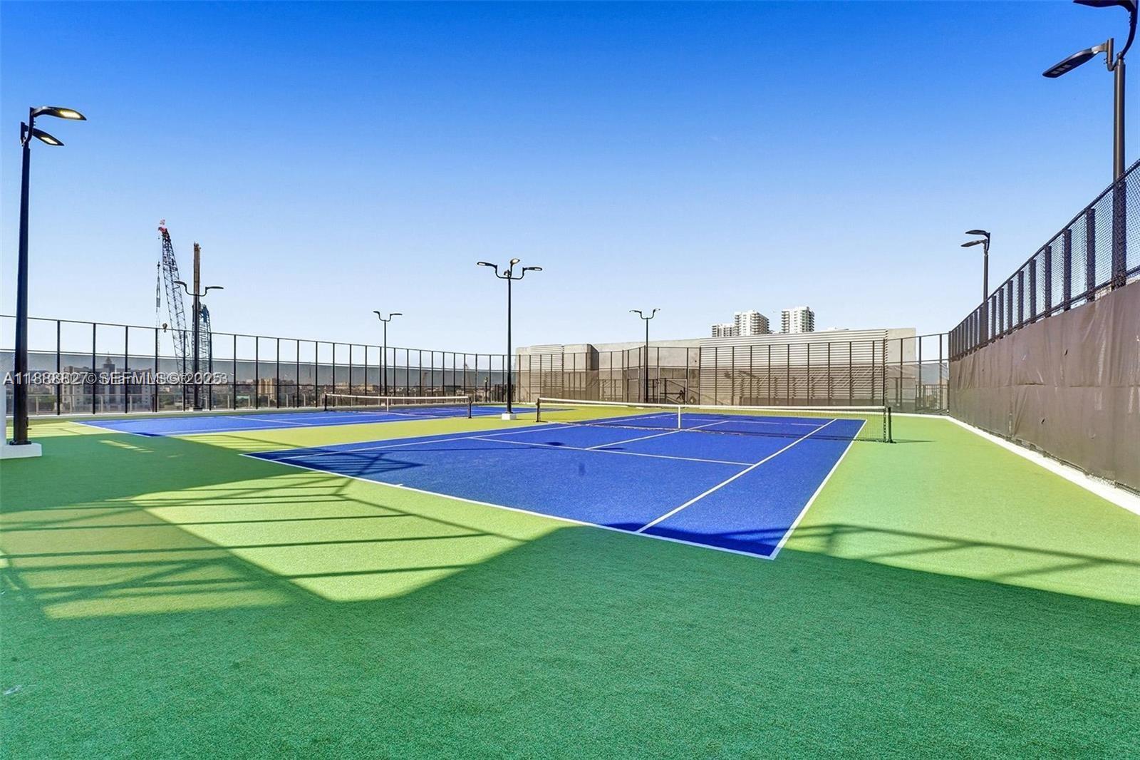 851 Northeast 1st Avenue, Unit 3601 Miami, FL 33132 - Photo 47 of 49 a view of a tennis court