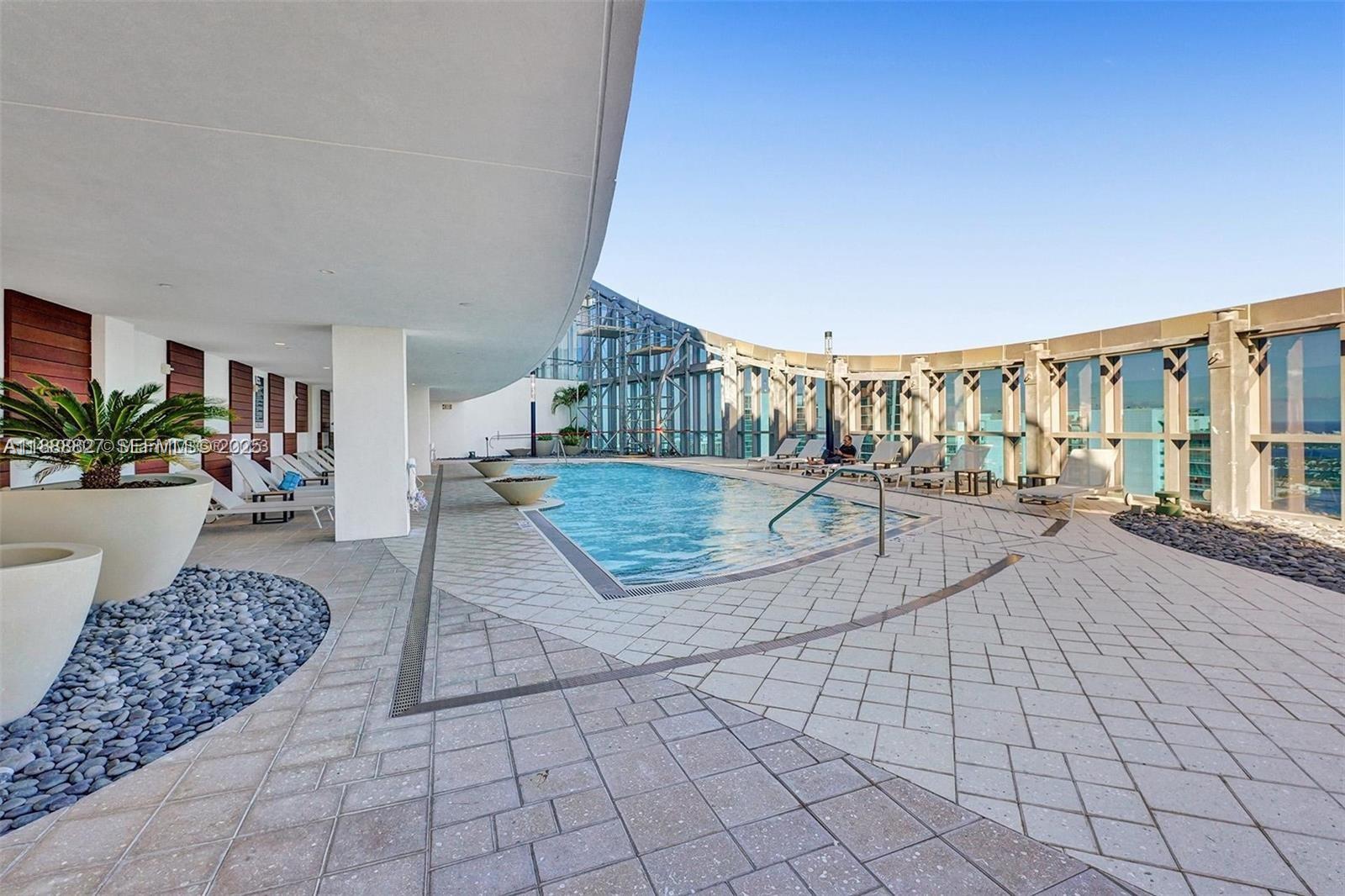 851 Northeast 1st Avenue, Unit 3601 Miami, FL 33132 - Photo 48 of 49 a view of swimming pool with seating space