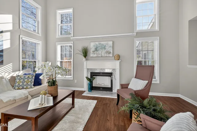 a kitchen with sink cabinets and wooden floor